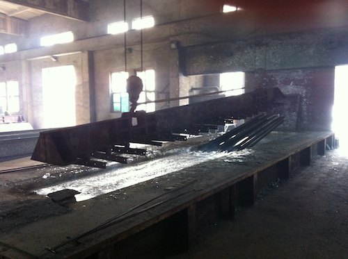 Angle Iron Plunged Into Molten Zinc Bath
